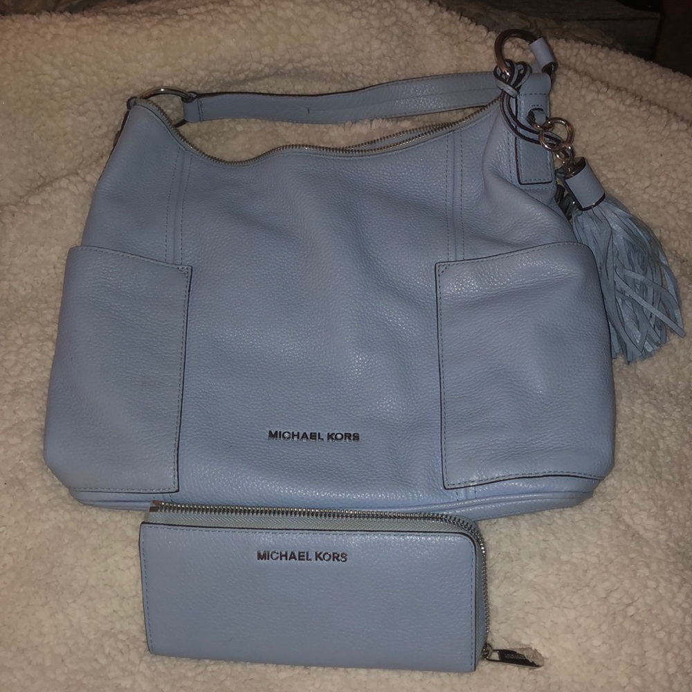 Blue Michael Kors tote and matching wallet